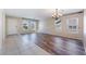 Bright living room featuring tile and wood-look flooring, and natural light at 206 Lynbrook St, Henderson, NV 89012