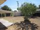 Spacious backyard with a covered patio and ample room for outdoor activities at 2108 E Ogden Ave, Las Vegas, NV 89101