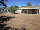 A large yard offering plenty of space with a covered patio at 2108 E Ogden Ave, Las Vegas, NV 89101