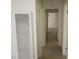 Bright hallway featuring tile floors, neutral walls and access to other rooms at 2108 E Ogden Ave, Las Vegas, NV 89101