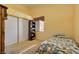 Comfortable bedroom with a twin bed, closet, and natural light from the window at 2110 Los Feliz St # 2064, Las Vegas, NV 89156