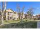 A nice apartment building complex with picnic tables on a grassy area at 2110 Los Feliz St # 2064, Las Vegas, NV 89156