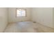 Simple bedroom with a window providing natural light, and wall outlets for convenience at 2152 Turquoise Ridge St # 105, Las Vegas, NV 89117
