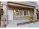 Charming condo exterior with a cozy entryway and well-maintained landscaping at 2152 Turquoise Ridge St # 105, Las Vegas, NV 89117
