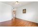 Spacious bedroom with wood-look floors and an open door at 2201 Ramsgate Dr # 823, Henderson, NV 89074