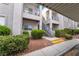 Cozy apartment building with multiple levels, featuring well-maintained landscaping and convenient stair access at 2201 Ramsgate Dr # 823, Henderson, NV 89074