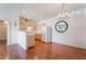 Clean kitchen featuring bright countertops, white appliances and decorative lighting at 2201 Ramsgate Dr # 823, Henderson, NV 89074