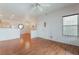 Bright living area with laminate flooring, kitchen access and lots of natural light at 2201 Ramsgate Dr # 823, Henderson, NV 89074