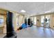 Well-equipped gym with various exercise machines, weights, and workout equipment at 230 E Flamingo Rd # 229, Las Vegas, NV 89169