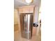 Kitchen featuring stainless steel refrigerator and light wood cabinetry at 230 E Flamingo Rd # 229, Las Vegas, NV 89169