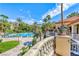 Beautiful pool area with lush landscaping and comfortable lounge chairs for relaxing poolside at 230 E Flamingo Rd # 229, Las Vegas, NV 89169