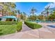 Inviting pool area with cabanas and lush landscaping at The Meridian Private Residences, Las Vegas at 230 E Flamingo Rd # 229, Las Vegas, NV 89169