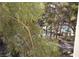 Enjoy serene views of the community pool surrounded by lush trees from the property at 230 E Flamingo Rd # 229, Las Vegas, NV 89169