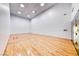 Spacious racquetball court with hardwood flooring and glass back wall at 230 E Flamingo Rd # 229, Las Vegas, NV 89169