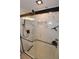 Modern shower with a sleek glass door, rainfall shower head, and a convenient built-in shelf for toiletries at 230 E Flamingo Rd # 229, Las Vegas, NV 89169