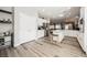 Open-concept kitchen with a center island and stainless steel appliances at 2306 Valley Cottage Ave, Henderson, NV 89052