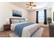 Relaxing bedroom with a cozy bed, contemporary decor, and a ceiling fan for added comfort at 231 W Horizon Ridge Pkwy # 1011, Henderson, NV 89012