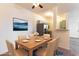 Charming dining area with seating for six, adjacent to the kitchen for easy access at 231 W Horizon Ridge Pkwy # 1011, Henderson, NV 89012
