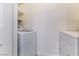 Convenient laundry room with a washer and dryer, providing ease for laundry tasks at 231 W Horizon Ridge Pkwy # 1011, Henderson, NV 89012