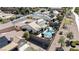 A high angle shot showcases the home's private backyard oasis, which includes a pool, shaded patio, and lush landscaping at 2665 Chateau Clermont St, Henderson, NV 89044