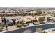 An elevated shot of the house, set amongst similar homes with desert landscaping at 2665 Chateau Clermont St, Henderson, NV 89044