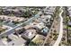 An aerial view captures houses in the community and a walking path, showcasing the neighborhood's layout and amenities at 2665 Chateau Clermont St, Henderson, NV 89044