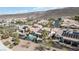 An aerial shot of a home featuring a private backyard oasis, which includes a pool, patio, and lush landscaping at 2665 Chateau Clermont St, Henderson, NV 89044