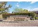 Viderias neighborhood entrance sign with manicured landscaping and stone accents at 2665 Chateau Clermont St, Henderson, NV 89044