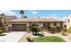 Charming single-story home with desert landscaping and a spacious two-car garage at 2665 Chateau Clermont St, Henderson, NV 89044