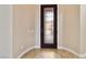 Elegant front door with decorative glass and tile flooring in the entry foyer at 2665 Chateau Clermont St, Henderson, NV 89044