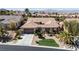 Beautiful single-story home with a well-manicured front yard and desert landscaping at 2665 Chateau Clermont St, Henderson, NV 89044