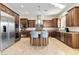 Spacious kitchen features stainless steel appliances, island with seating, and extensive cabinets at 2665 Chateau Clermont St, Henderson, NV 89044
