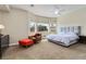 Spacious main bedroom featuring bay windows and a comfortable seating area at 2665 Chateau Clermont St, Henderson, NV 89044
