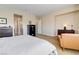 Cozy main bedroom with modern furnishings and carpeted floor at 2665 Chateau Clermont St, Henderson, NV 89044