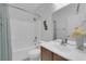 Well-lit bathroom with a shower-tub combo, a ceramic toilet, and a vanity with a sink and mirror at 2709 Rue Montpellier Ave, Henderson, NV 89044