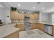 Well-equipped kitchen with stainless steel appliances and ample counter space at 2709 Rue Montpellier Ave, Henderson, NV 89044