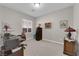 Functional home office space with a desk, chair, and ample lighting for a productive work environment at 2709 Rue Montpellier Ave, Henderson, NV 89044