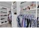 Large walk-in closet with custom shelving and clothing racks for optimal storage and organization at 2709 Rue Montpellier Ave, Henderson, NV 89044