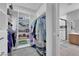 Bright walk-in closet with custom shelving and storage, next to the bathroom at 2709 Rue Montpellier Ave, Henderson, NV 89044