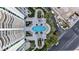 Aerial view of condo rooftop pool, garden, lounge areas, and surrounding high-rise buildings at 2777 Paradise Rd # 301, Las Vegas, NV 89109