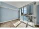Bedroom with hardwood floors and floor-to-ceiling windows at 2777 Paradise Rd # 301, Las Vegas, NV 89109