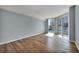 Light-filled room with wide-plank wood floors and large windows offering city views at 2777 Paradise Rd # 301, Las Vegas, NV 89109