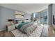 Bright and airy bedroom with a king size bed and a private balcony overlooking the Las Vegas Strip at 2777 Paradise Rd # 301, Las Vegas, NV 89109