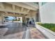 Circular driveway leads to a covered building entrance with valet, providing a luxurious arrival experience at 2777 Paradise Rd # 301, Las Vegas, NV 89109
