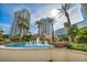 Beautiful fountain surrounded by lush landscaping and towering condo buildings, perfect for relaxation at 2777 Paradise Rd # 301, Las Vegas, NV 89109