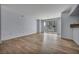 Living room features hardwood floors, an open concept, and a balcony overlooking the community pool at 2777 Paradise Rd # 301, Las Vegas, NV 89109