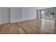 Living room with hardwood floors and a view of the pool from the balcony at 2777 Paradise Rd # 301, Las Vegas, NV 89109
