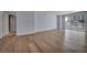 Open floor plan with hardwood floors leading to a balcony offering views of the pool at 2777 Paradise Rd # 301, Las Vegas, NV 89109