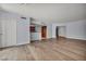 Open living space with hardwood floors and a view into the kitchen area at 2777 Paradise Rd # 301, Las Vegas, NV 89109