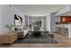 Bright and airy living room with comfortable furniture, a modern bar, and views of the Las Vegas Strip at 2777 Paradise Rd # 301, Las Vegas, NV 89109